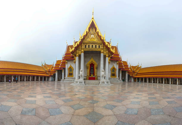 Bangkok, Thailand - June 30, 2017: Panorama of Wat Benchamabophit also known as Marble Temple at sunset on June 30, 2017 in Bangkok, Thailand.
