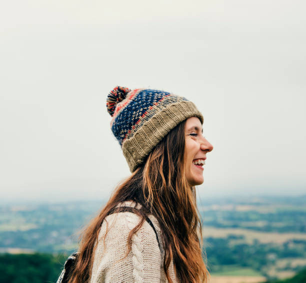istock Woman Smiling Mountain Carefree Cloudscape Concept 804955280