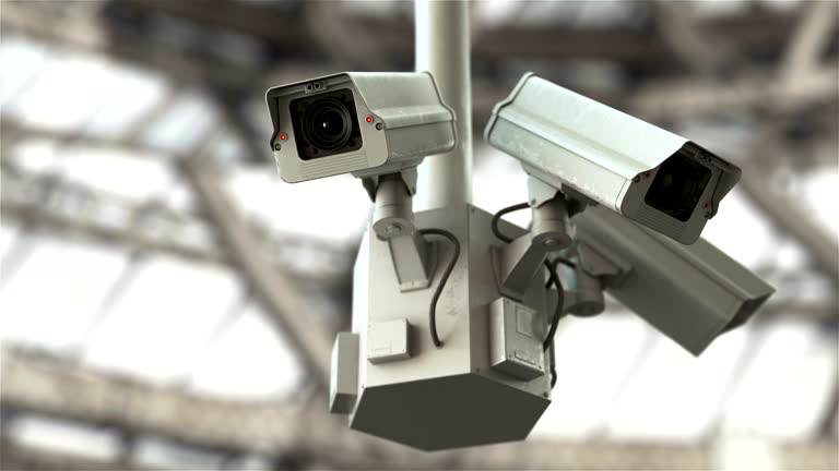 Security cameras scanning the street in 4K