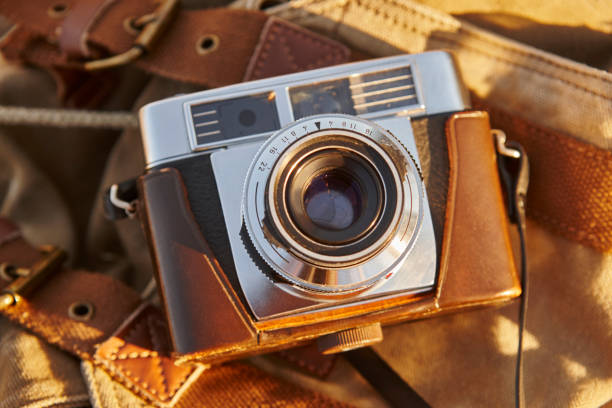 istock Vintage camera with backpack at dawn. Travel 804971722