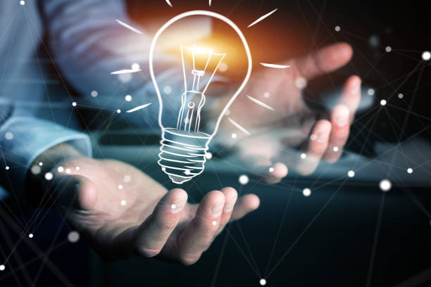 istock Businessman holding a sketch lightbulb 804980766