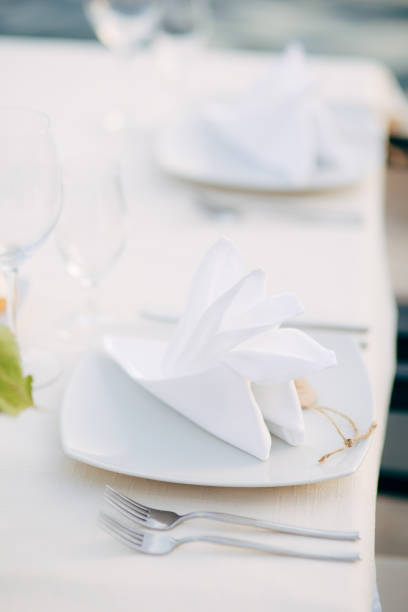 istock Plates at the wedding banquet. Table setting. Wedding decoration 804993586