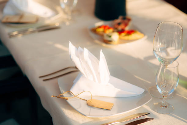 istock Plates at the wedding banquet. Table setting. Wedding decoration 804997888