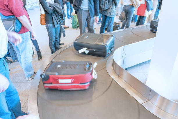 istock Passengers arriving and the conveyor belt 804998500