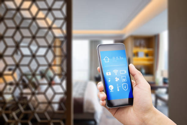 istock mobile phone with luxury bedroom in smart home 805000918