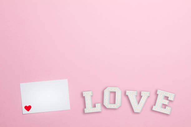 istock Pink background with white love letter 805001194