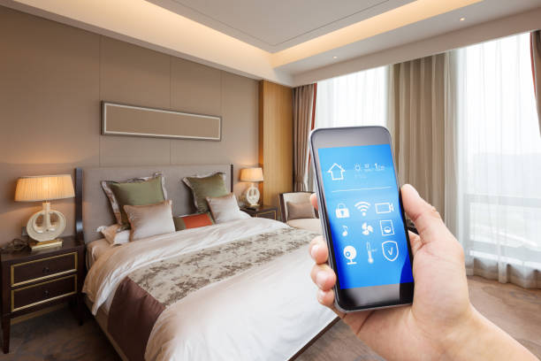 istock mobile phone with luxury bedroom in smart home 805001286