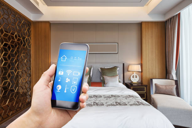 istock mobile phone with luxury bedroom in smart home 805009068