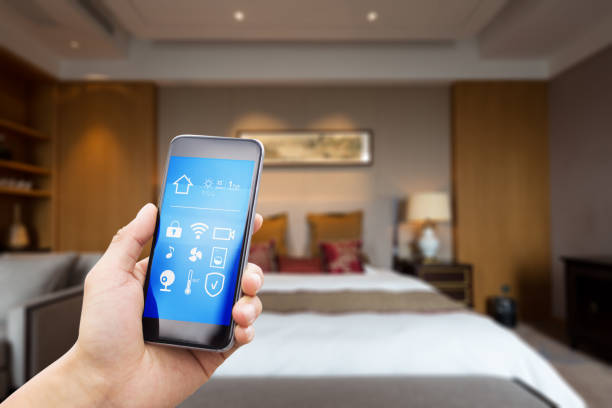istock mobile phone with luxury bedroom in smart home 805012978