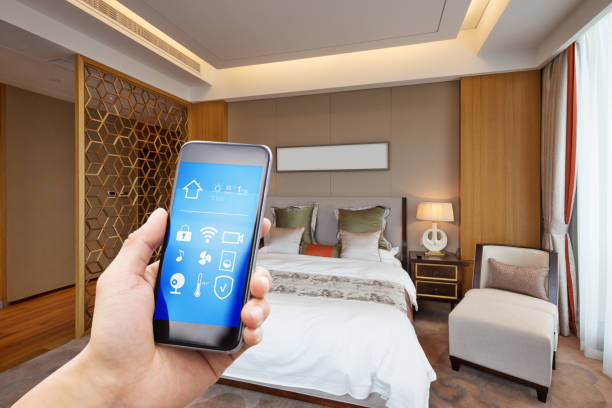 istock mobile phone with luxury bedroom in smart home 805015772