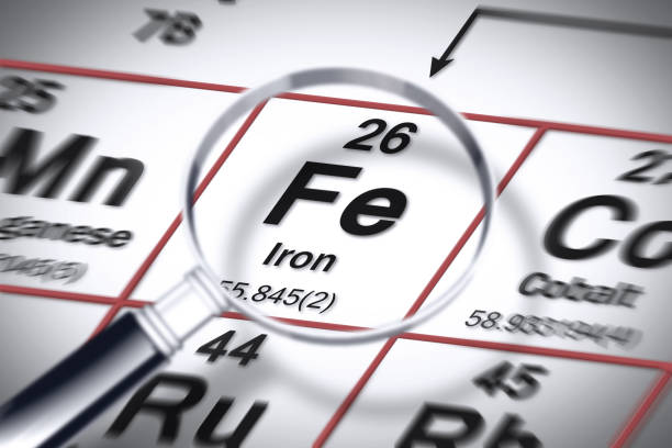 focus on iron chemical element - concept image with the mendeleev periodic table - mendeleev table imagens e fotografias de stock