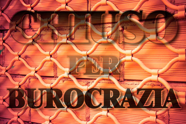 istock Closed due to bureaucracy - concept image in Italian language 805030406