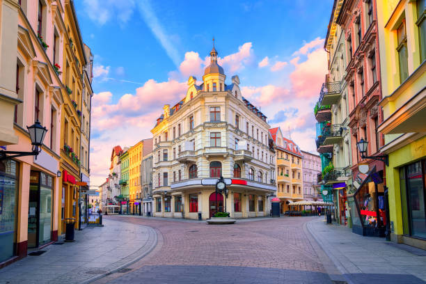 Sunset clouds over the traditional main pedestrian street in Torun, Poland, Eastern Europe