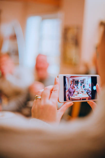 istock Taking a Photo at a Birthday Party 805034170