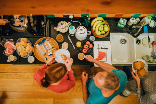 istock Overhead Shot of Friends Making Breakfast 805034518