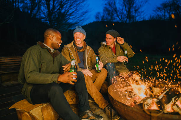 istock Mature Men Enjoying an Evening by the Fire 805043186