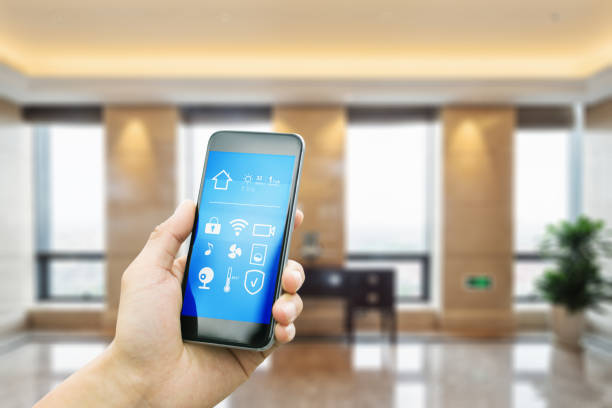 istock mobile phone with living room in smart home 805050298