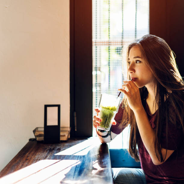 istock Young Woman Drinking Tea Concept 805050740