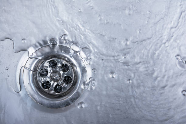 sink, drain and flowing water for background - heat sink imagens e fotografias de stock