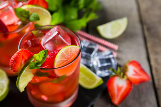 istock Strawberry mojito and ingredients on rustic background 805068012
