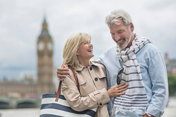 istock Smiling mature couple standing against Big Ben 805085204