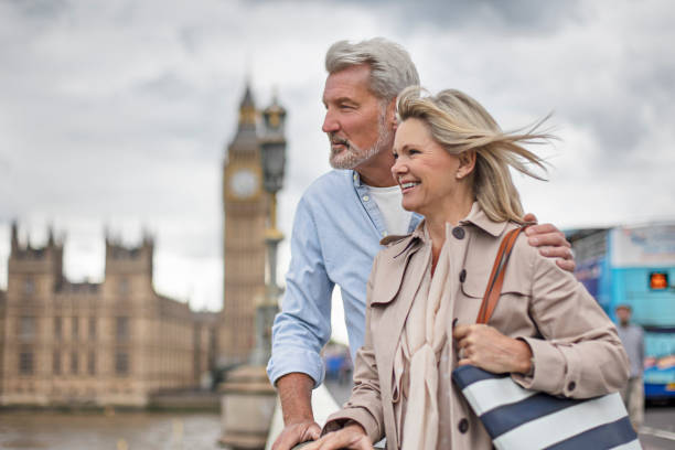 istock Smiling woman and man against Big Ben 805085342