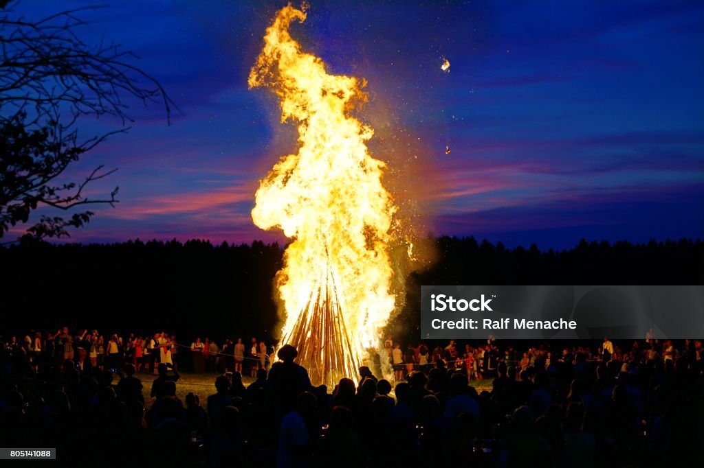 Bavaria, Customs and tradition. Johannisfeuer or Sonnwendfeuer where  Straw dolls are burned at Saint John's Eve. John The Baptist Stock Photo