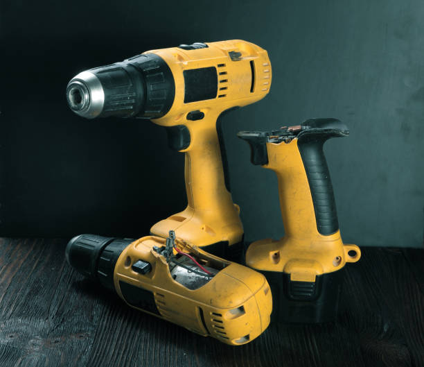 istock Electric drills on the wooden table 805158188