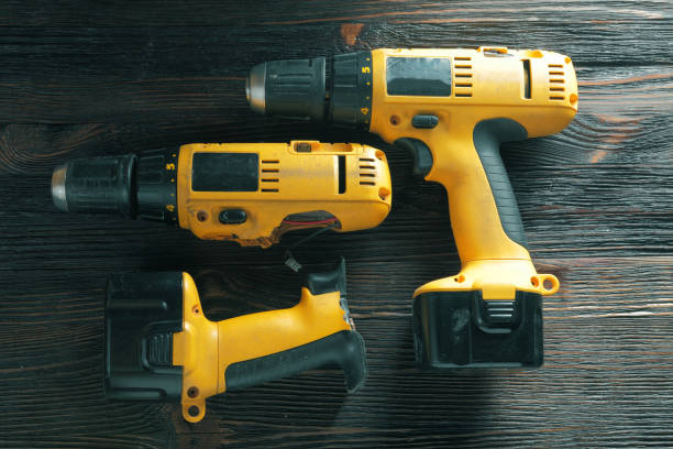 istock Electric drills on the wooden table 805158444