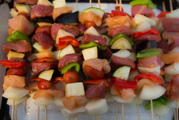 istock Raw meat and veggies brochettes 805173426