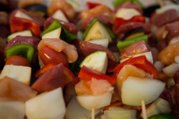 istock Raw meat and veggies brochettes 805175732