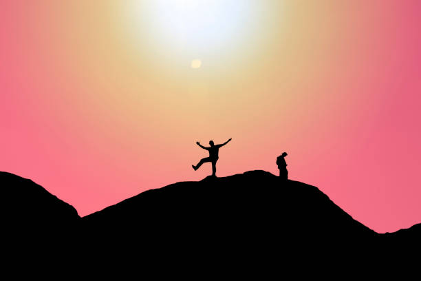 istock Silhouettes of people on mountains 805183746
