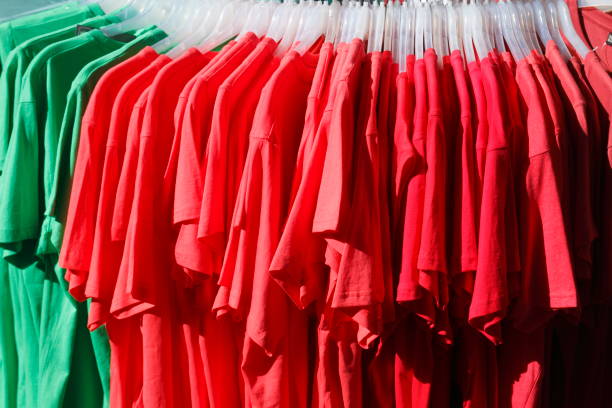 istock Red T-shirts on hangers 805187590