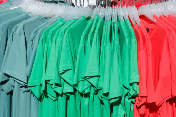 istock Colorful T-shirts on hangers 805187620