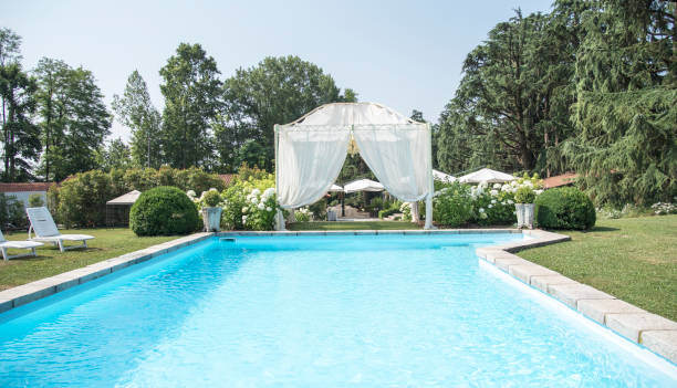 istock Wedding location - swimming pool view with white lining 805227558