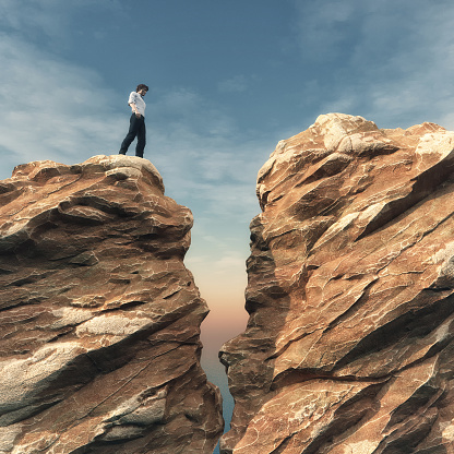 Young man on a rock in front of a chasm. This is a 3d render illustration