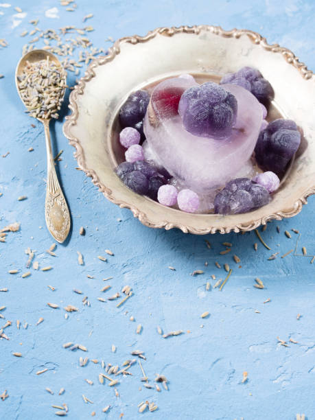 istock Lavender ice cream flower shaped cubes 805280344