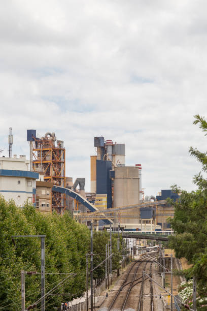 istock industrial building factory with structure and railroad 805297072