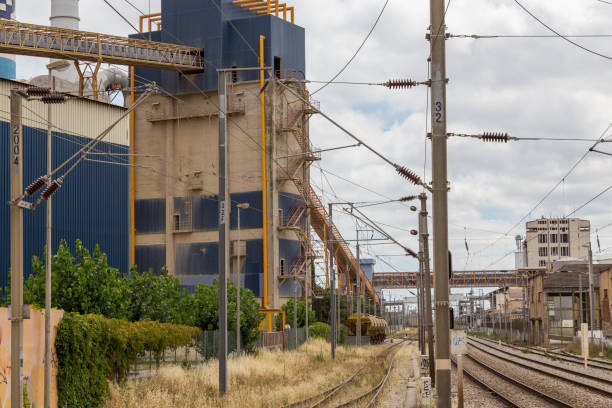 istock industrial building factory with structure and railroad 805310600