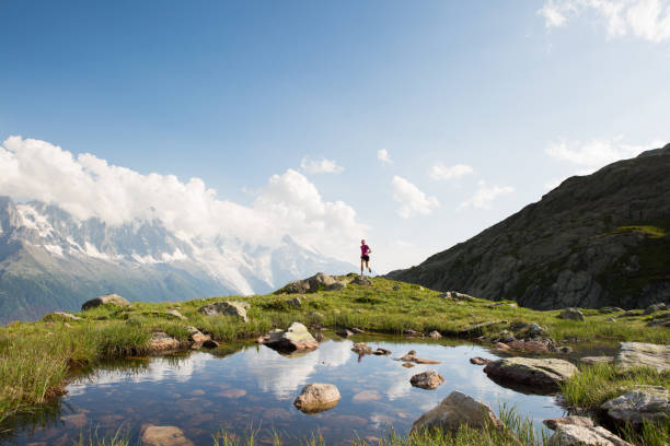 istock Female running in the Alps 805311522