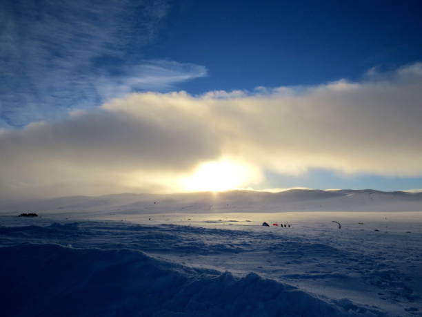 istock Wind surfing and snowkiting in winter 805350068