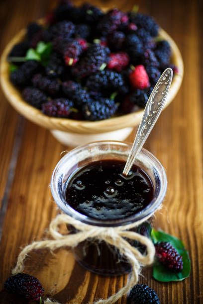istock Sweet jam of black mulberry 805366380