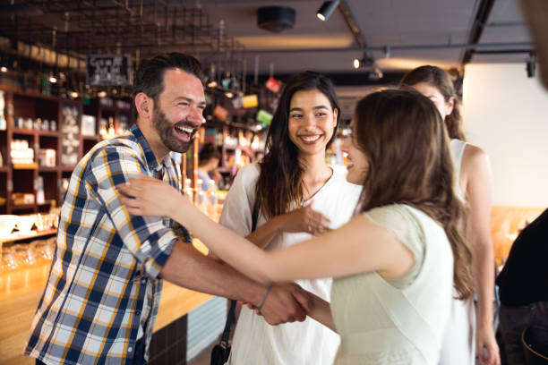 Friends celebrating a party in a cafe