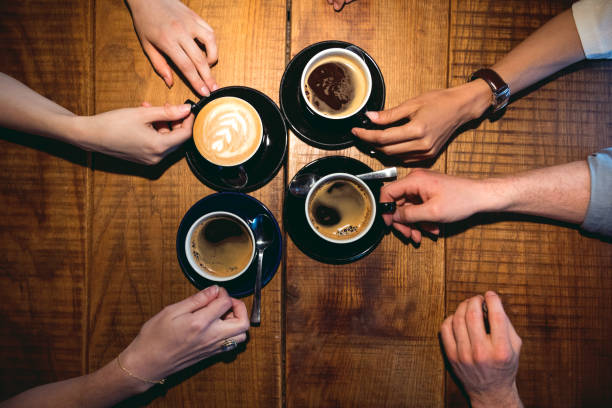istock Friends celebrating a party in a cafe 805378252
