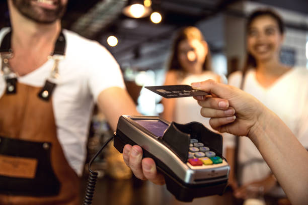 istock Paying the bill using a contactless credit card 805378276