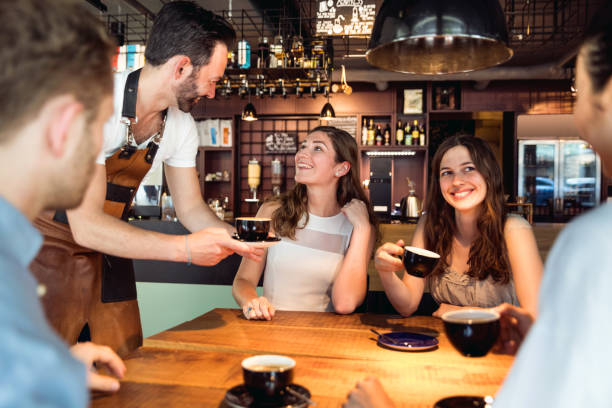 istock Friends celebrating a party in a cafe 805378290