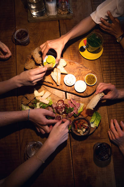 istock Friends celebrating a party in a cafe 805378850