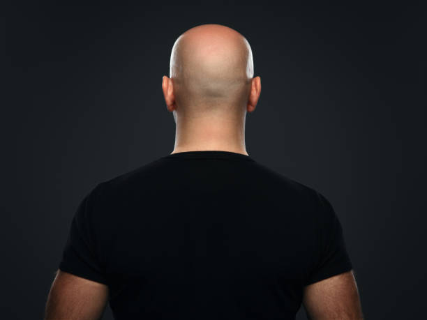 istock bald man in a T-shirt 805419134