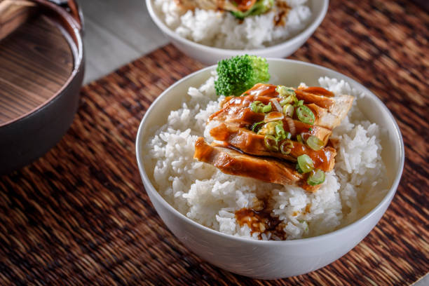 istock Grilled Chicken Breast with Teriyaki Sauce over Steamed Rice 805425346