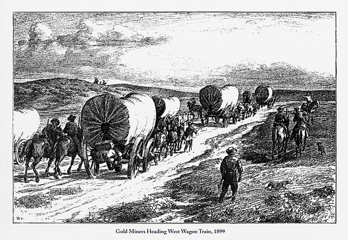 Beautifully Illustrated Antique Engraved Victorian Illustration of Gold Miners Heading West Wagon Train Victorian Engraving, 1899. Source: Original edition from my own archives. Copyright has expired on this artwork. Digitally restored.